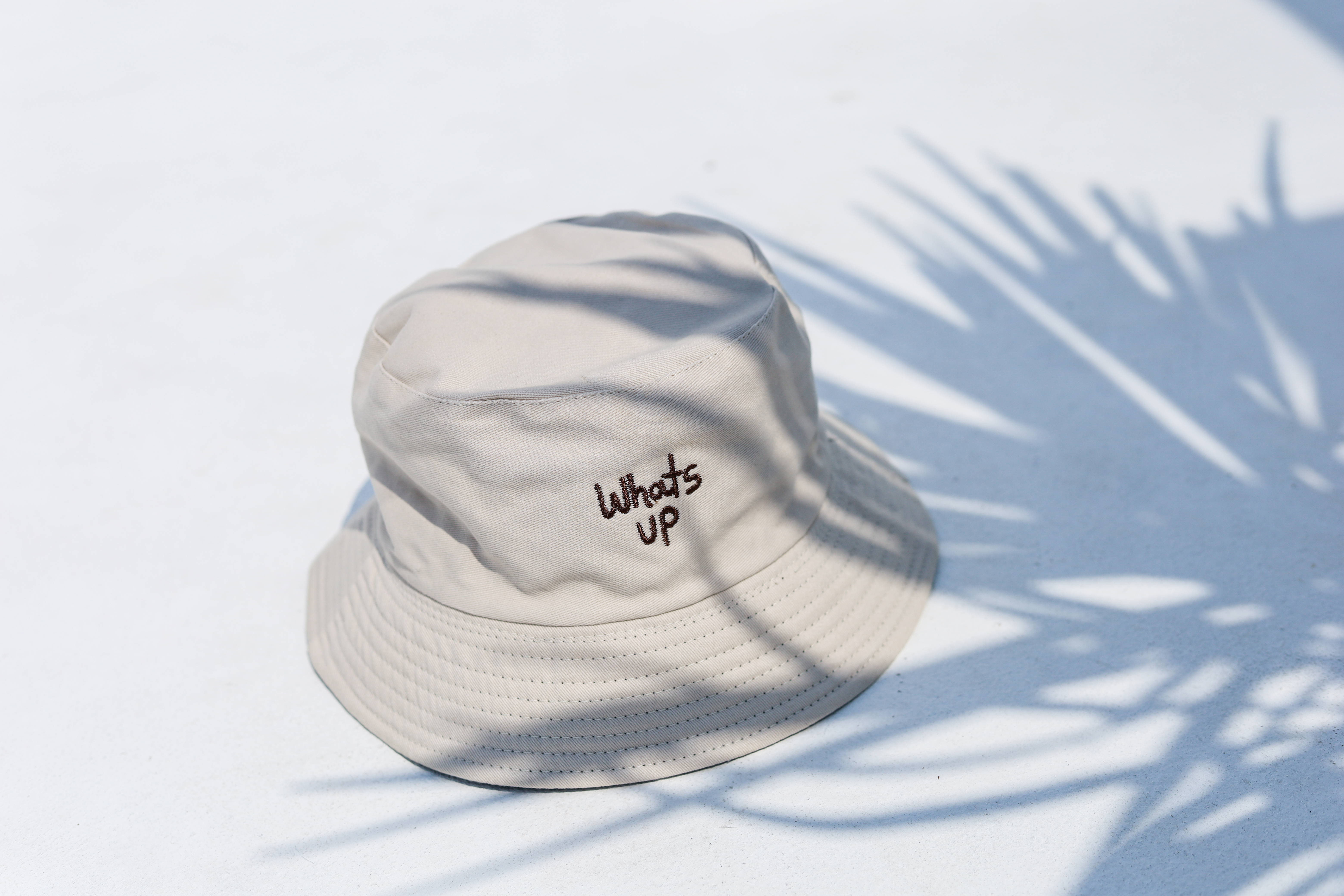 whats up bucket hat