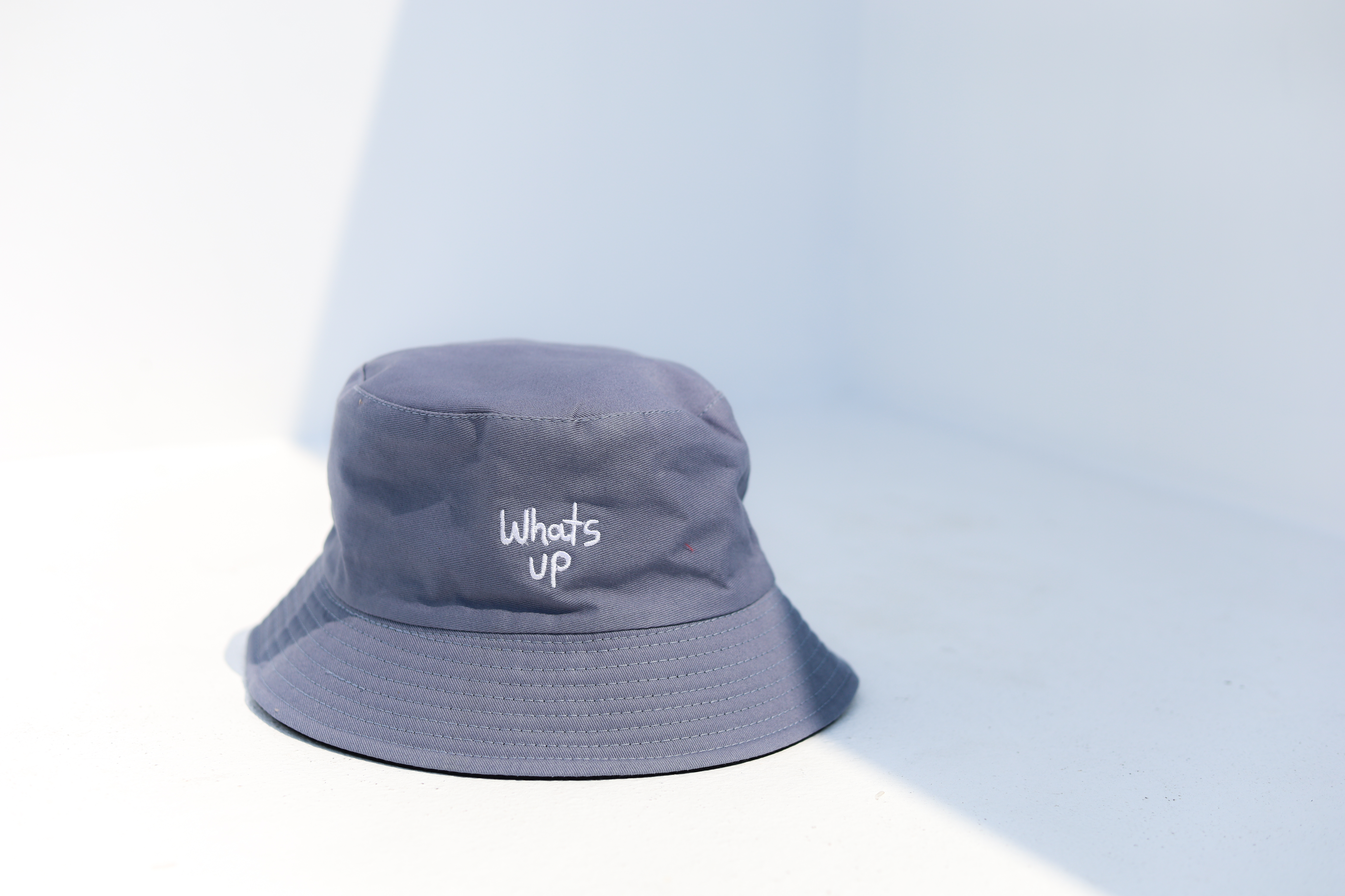 whats up bucket hat